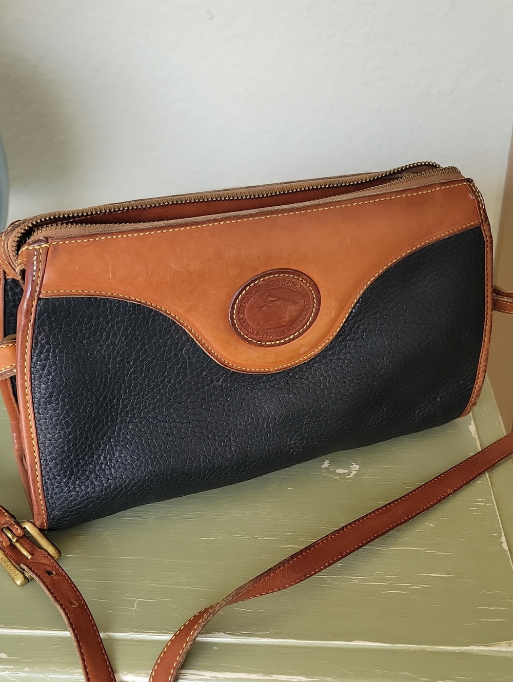 Dooney & Bourke Black & Tan Pebbled Leather Crossbody Clutch